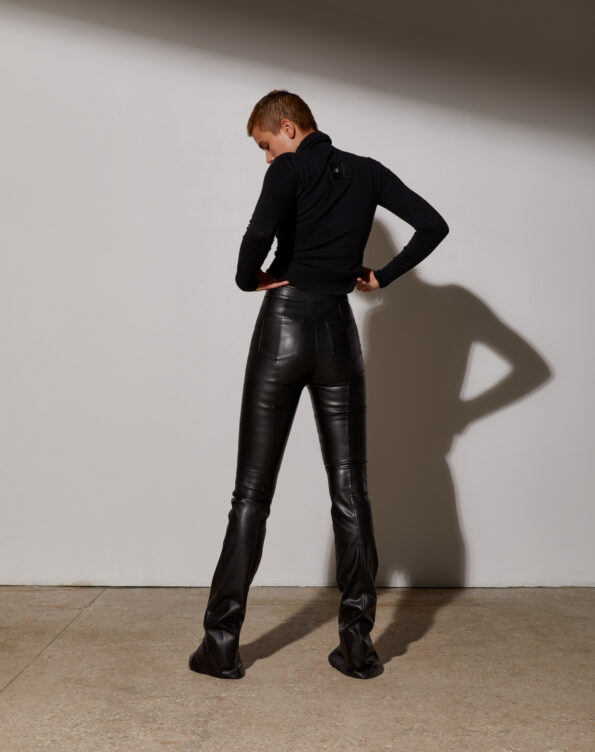 Pants with a stitched seam made of eco leather with a black thread