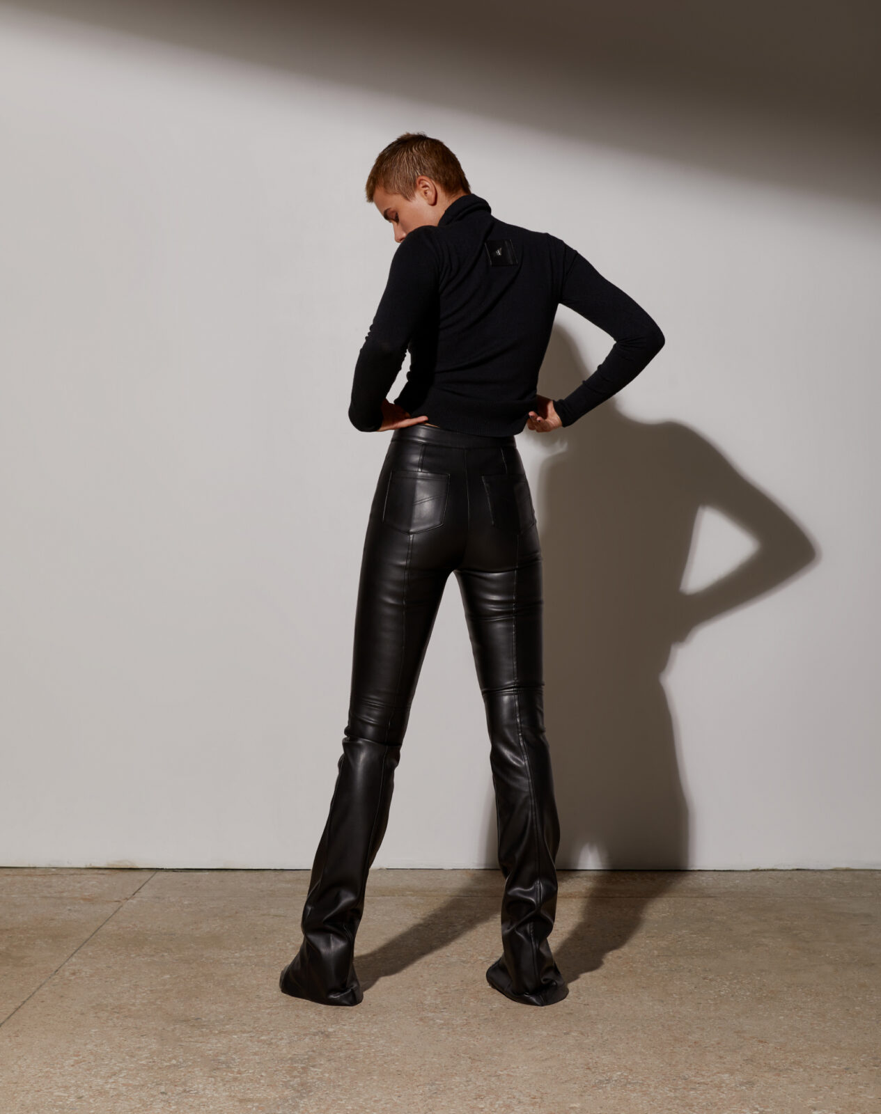 Pants-with-a-stitched-seam-made-of-eco-leather-with-a-black-thread-1-1