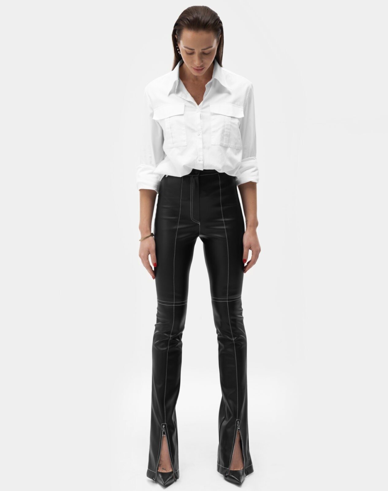 Pants-with-a-stitched-seam-made-of-eco-leather-with-a-white-thread1