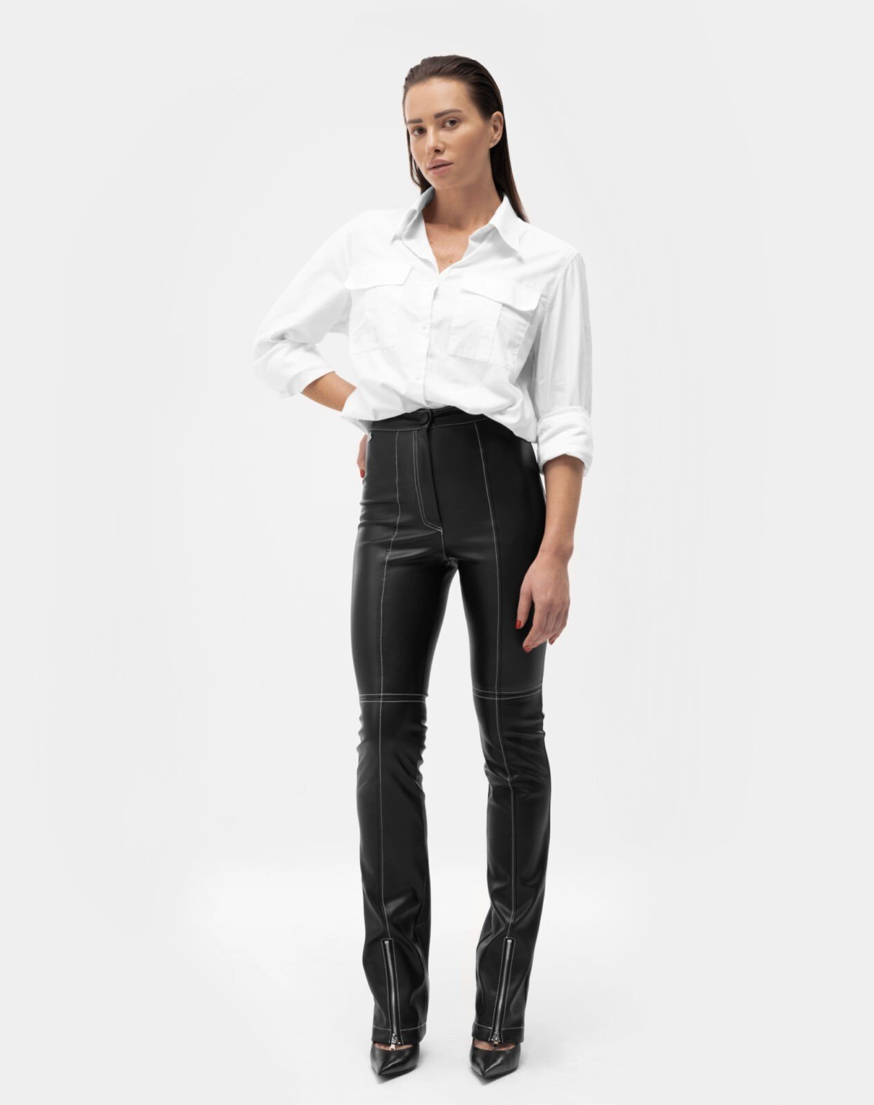 Pants-with-a-stitched-seam-made-of-eco-leather-with-a-white-thread4